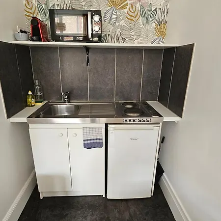 Au Pied Du Beffroi *